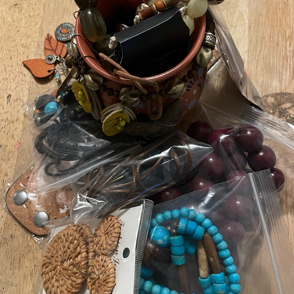 Brown terracotta vase with fun jewelry